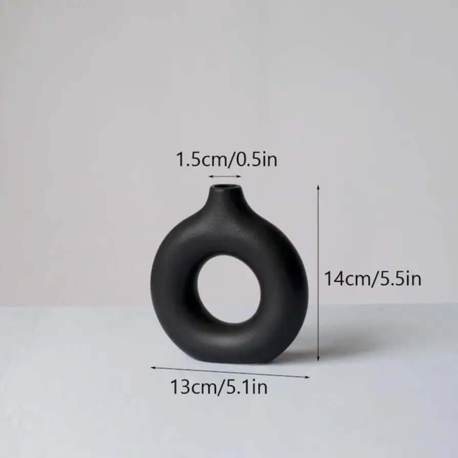 Sophisticated black vase displaying dimension markers