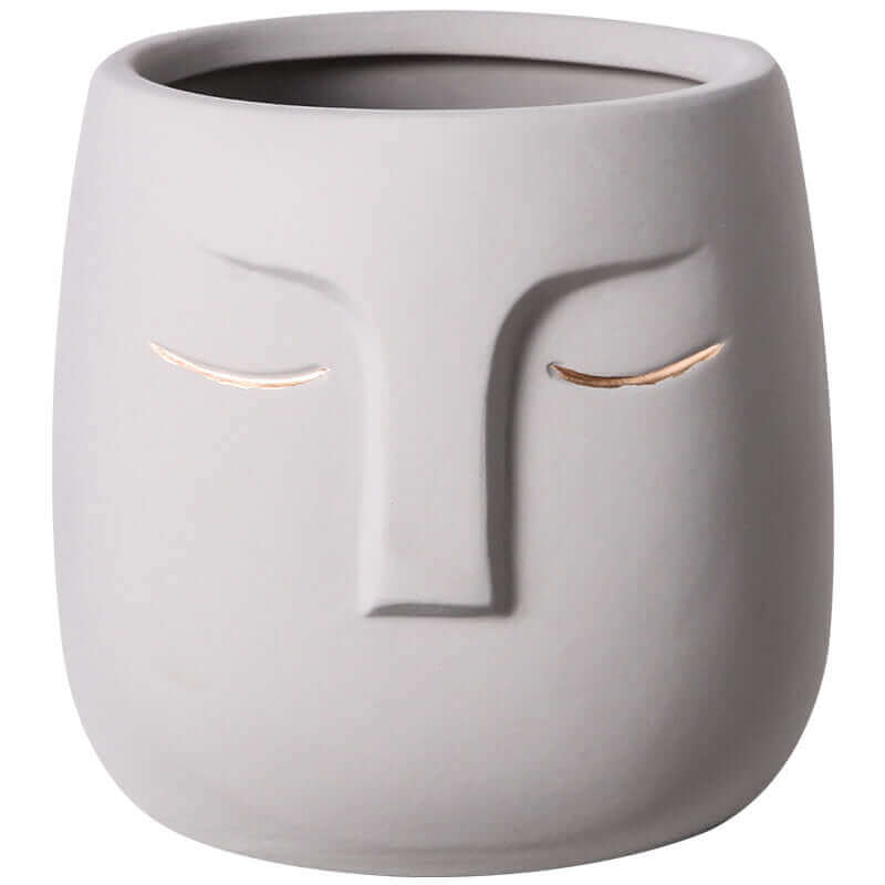 Elegant Ceramic Face Vase at MalonesSpecialtyStore.com