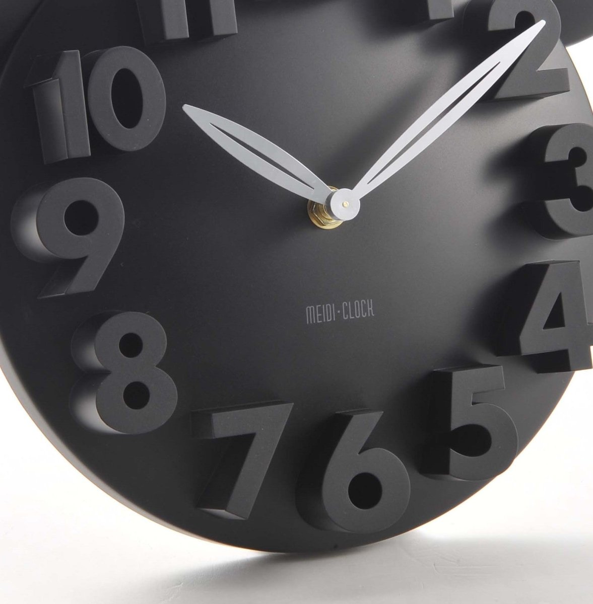 ColorPop Quartz Wall Clock in black, perfect for brightening up any room with a touch of vibrant style.